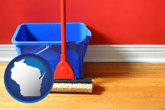wisconsin a bucket and mop on a hardwood floor