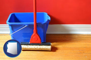 a bucket and mop on a hardwood floor - with Arizona icon