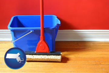 a bucket and mop on a hardwood floor - with Massachusetts icon