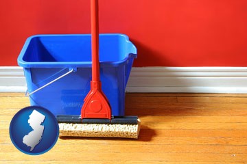 a bucket and mop on a hardwood floor - with New Jersey icon