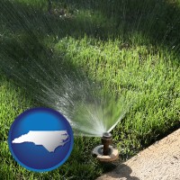 north-carolina map icon and a directional lawn sprinkler