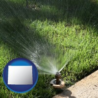 wyoming map icon and a directional lawn sprinkler