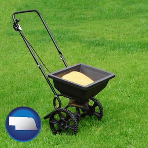 a lawn fertilizer spreader - with Nebraska icon