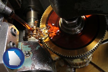 lubricating oil in machinery - with Georgia icon