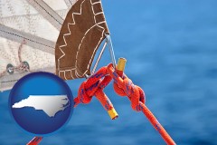 north-carolina map icon and marine knots on a sailboat