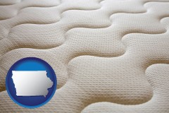iowa map icon and a mattress surface