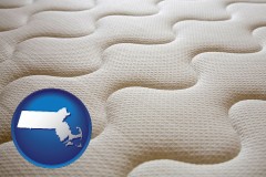 massachusetts map icon and a mattress surface