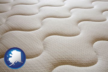 a mattress surface - with Alaska icon