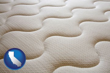 a mattress surface - with California icon
