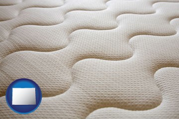 a mattress surface - with Colorado icon