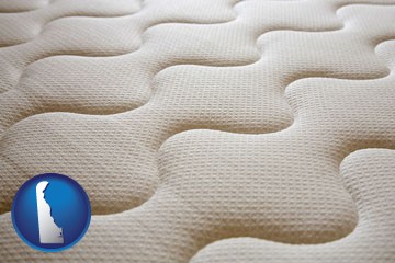 a mattress surface - with Delaware icon