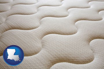 a mattress surface - with Louisiana icon