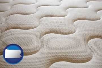 a mattress surface - with Pennsylvania icon