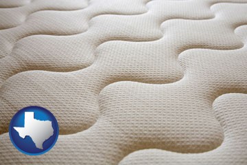 a mattress surface - with Texas icon