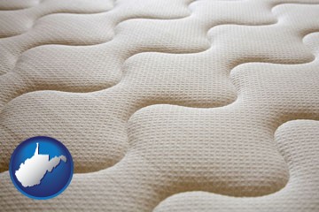a mattress surface - with West Virginia icon