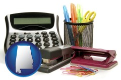 alabama map icon and office supplies: calculator, paper clips, pens, scissors, stapler, and staples