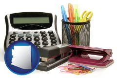 arizona map icon and office supplies: calculator, paper clips, pens, scissors, stapler, and staples