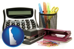 delaware map icon and office supplies: calculator, paper clips, pens, scissors, stapler, and staples