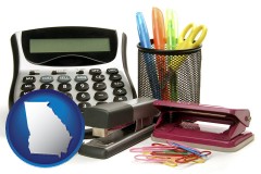 georgia map icon and office supplies: calculator, paper clips, pens, scissors, stapler, and staples