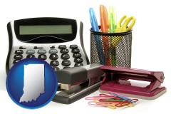 indiana map icon and office supplies: calculator, paper clips, pens, scissors, stapler, and staples