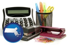 massachusetts map icon and office supplies: calculator, paper clips, pens, scissors, stapler, and staples