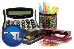 maryland map icon and office supplies: calculator, paper clips, pens, scissors, stapler, and staples
