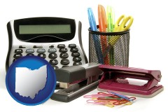 ohio map icon and office supplies: calculator, paper clips, pens, scissors, stapler, and staples