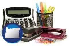 oregon map icon and office supplies: calculator, paper clips, pens, scissors, stapler, and staples