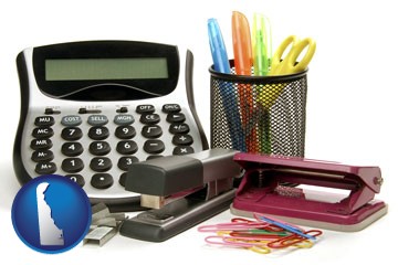 office supplies: calculator, paper clips, pens, scissors, stapler, and staples - with Delaware icon