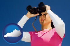 kentucky a woman looking through binoculars