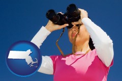 massachusetts a woman looking through binoculars