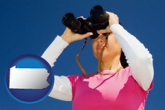 pennsylvania a woman looking through binoculars