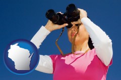 wisconsin a woman looking through binoculars