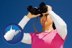 west-virginia a woman looking through binoculars