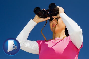 a woman looking through binoculars - with Rhode Island icon