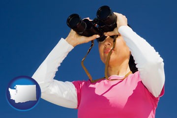 a woman looking through binoculars - with Washington icon