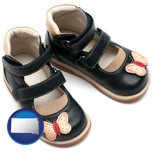 orthopedic shoes for a child - with South Dakota icon
