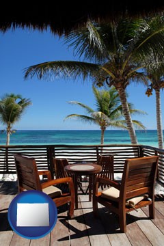 outdoor furniture on a tropical, oceanfront deck - with Colorado icon