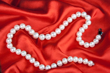 a faux pearl necklace