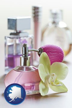 a perfume bottle, with atomizer, and an orchid flower - with Alaska icon