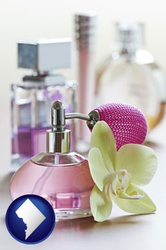a perfume bottle, with atomizer, and an orchid flower - with Washington, DC icon