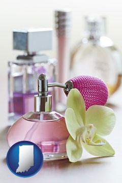a perfume bottle, with atomizer, and an orchid flower - with Indiana icon