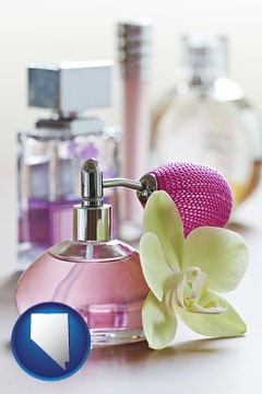 a perfume bottle, with atomizer, and an orchid flower - with Nevada icon