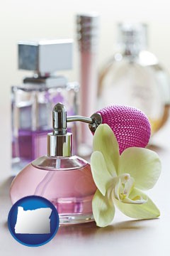 a perfume bottle, with atomizer, and an orchid flower - with Oregon icon