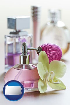 a perfume bottle, with atomizer, and an orchid flower - with Pennsylvania icon