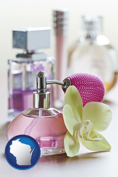 a perfume bottle, with atomizer, and an orchid flower - with Wisconsin icon