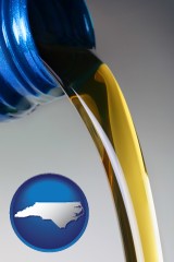 north-carolina map icon and motor oil being poured from a container