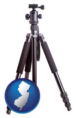 new-jersey map icon and a camera tripod