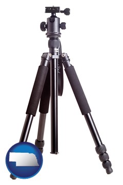 a camera tripod - with Nebraska icon