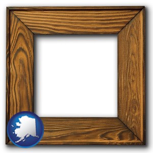 a wooden picture frame - with Alaska icon